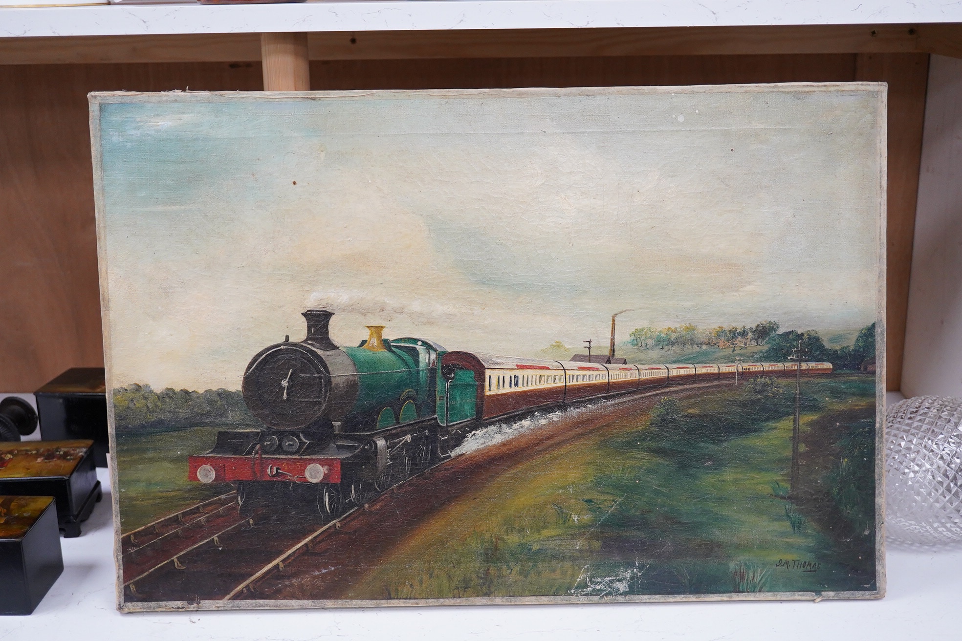 J.M. Thomas, oil on canvas, 20th century English School, Study of a Steam engine locomotive, 40 x 61cm, unframed. Condition - poor to fair